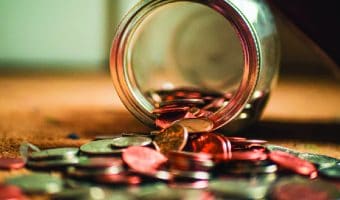 image of money flowing from a jar