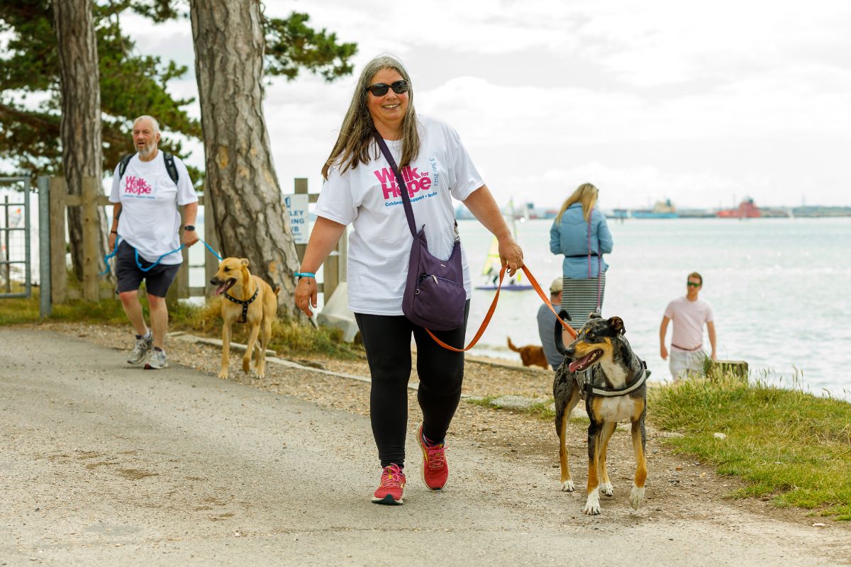 Walk for Hope 2022 lady with dog on beach