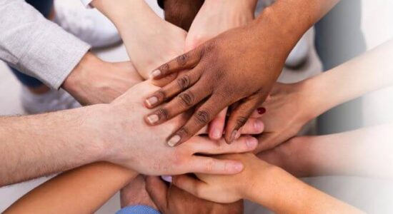 Image of sets of hands linked together