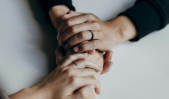 Image of people holding hands