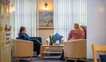 Image of people sitting in the Bournemouth Cancer Support Centre
